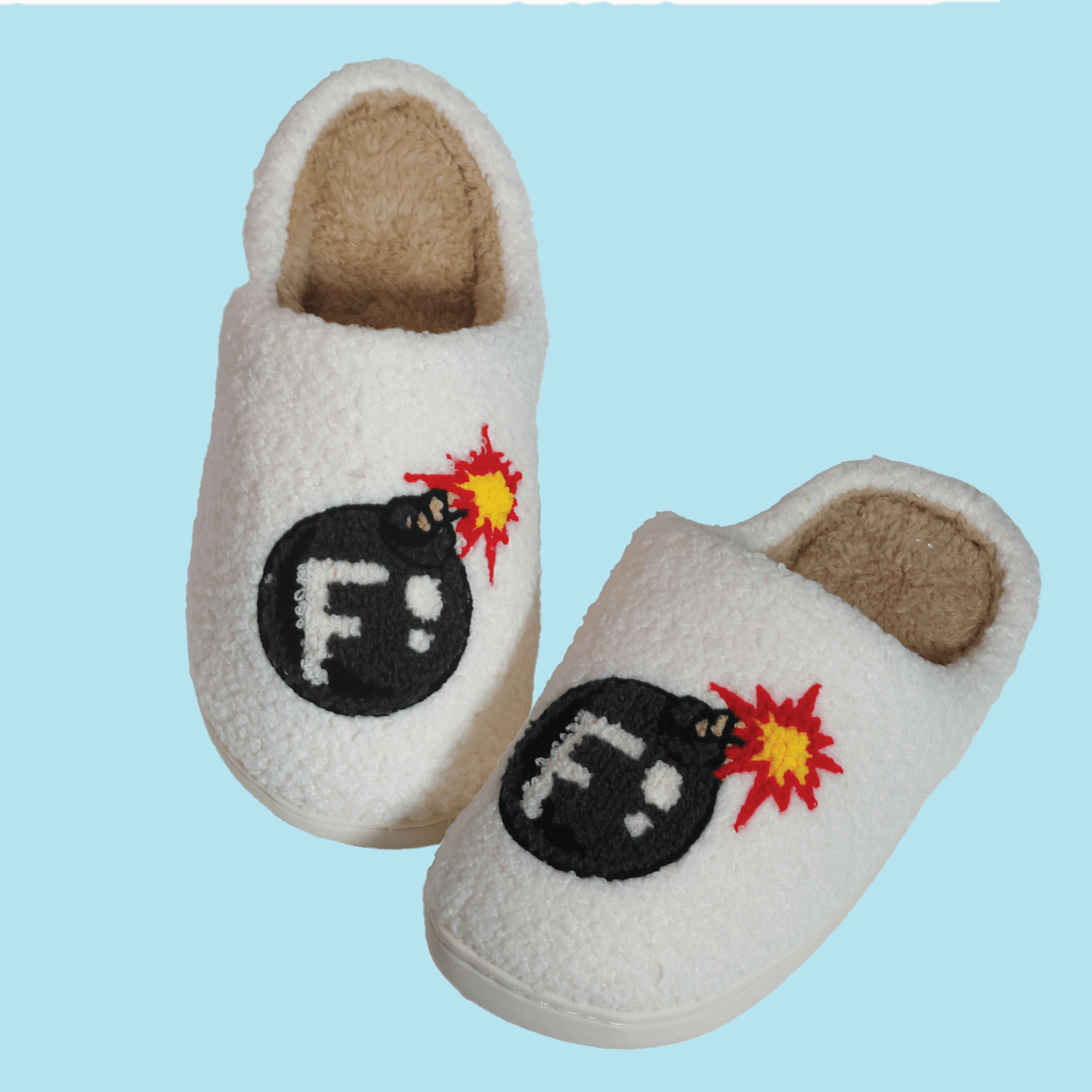 White cozy slippers with embroidered F-bomb design, part of Ultimate F-Bomb Pack equestrian accessories