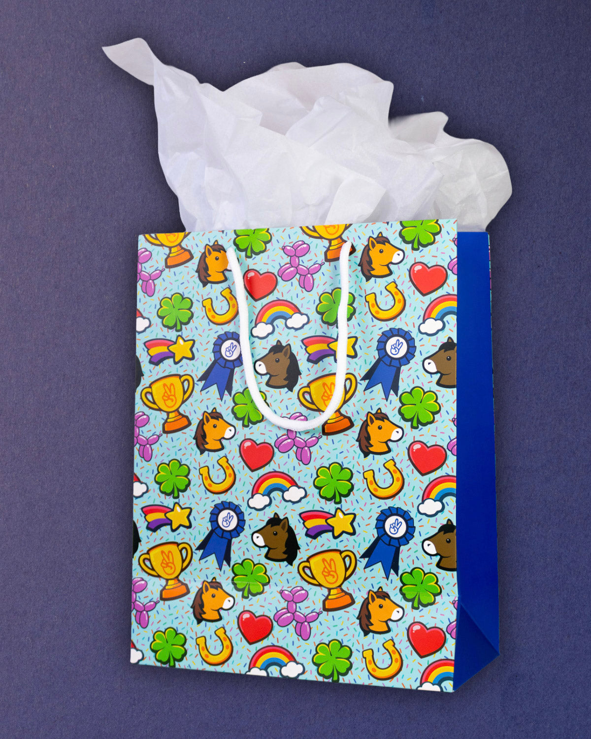 Full O' Luck medium gift bag standing front-on, a sliver of blue gusset visible at the right edge.