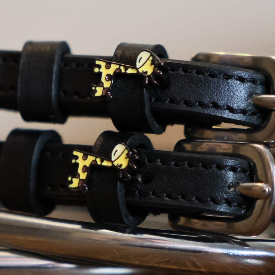 Black leather Giraffe Spur Straps with stainless steel buckle and custom charm on peg display card