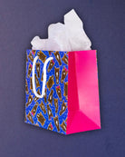Hairy Styles small gift bag turned right, pink side gusset showing the depth of the little cube.