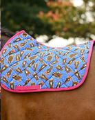 Bright blue Hairy Styles pad printed with brown horse heads in bows and braids, hot pink binding, no saddle