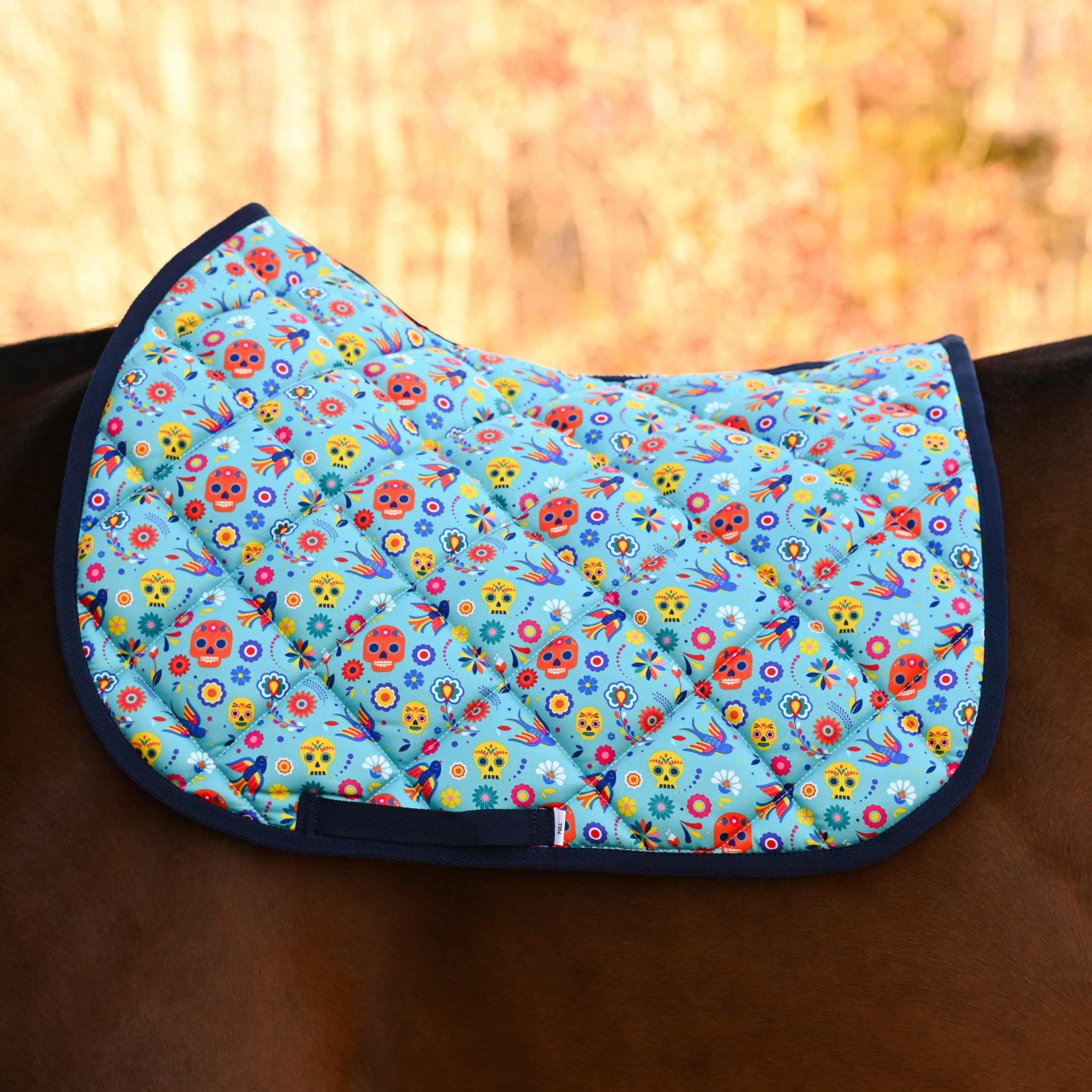 Dreamers & Schemers Holiday Day of the Dead Saddle Pad – patterned saddle pad, equestrian gift, horseback riding gear from Dreamers & Schemers Saddle Pads