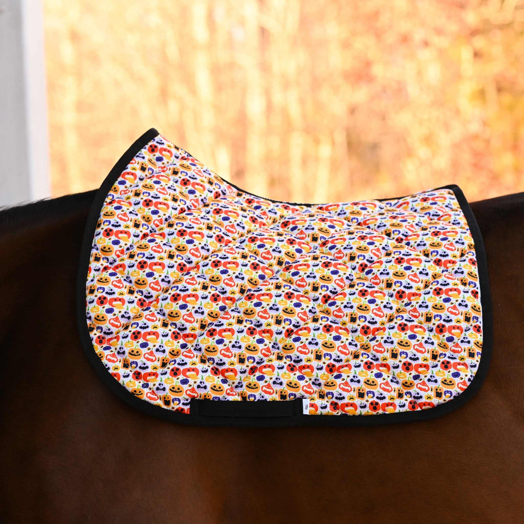 Dreamers & Schemers Holiday Pumpkin Party Saddle Pad – patterned saddle pad, equestrian gift, horseback riding gear from Dreamers & Schemers Saddle Pads