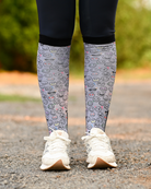 Horse Ownership equestrian boot socks worn at the barn, soft grey with the emoji faces of horse ownership