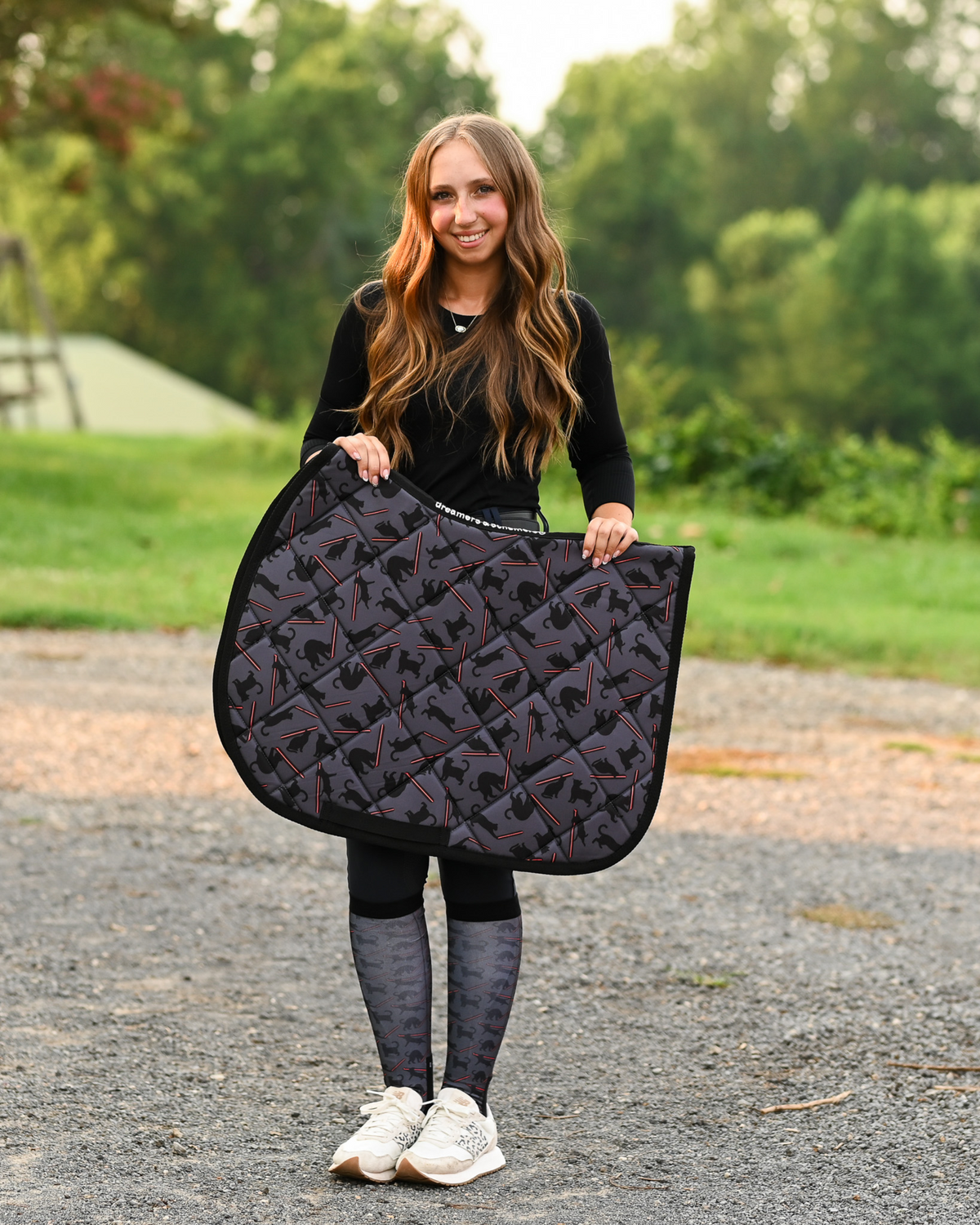 Laser Cats all-purpose saddle pad in charcoal, printed with black cats firing red laser beams