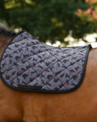Grey Laser Cats pad covered in dark cats and red laser beams, shown saddle-free across a bay horse