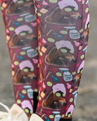 Detail of the Mani Pedi pattern, horses in spa turbans and cucumber slices across a deep maroon ground