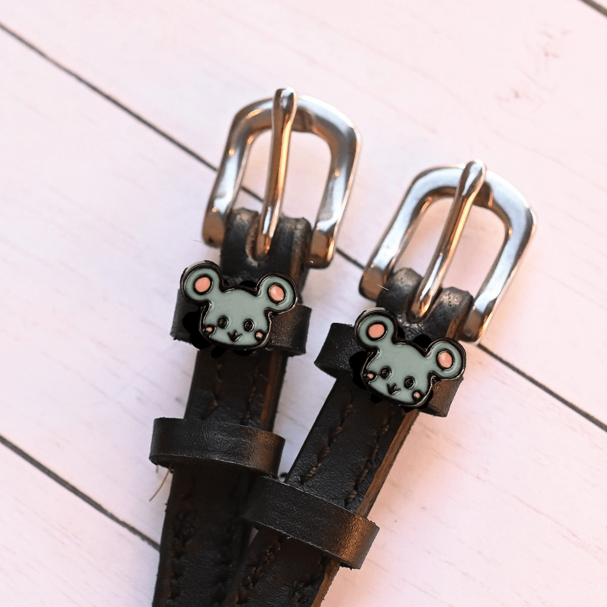 Mouse Spur Straps ManeJane black leather spur straps with non-stretch interior and stainless steel buckle for English ridin.