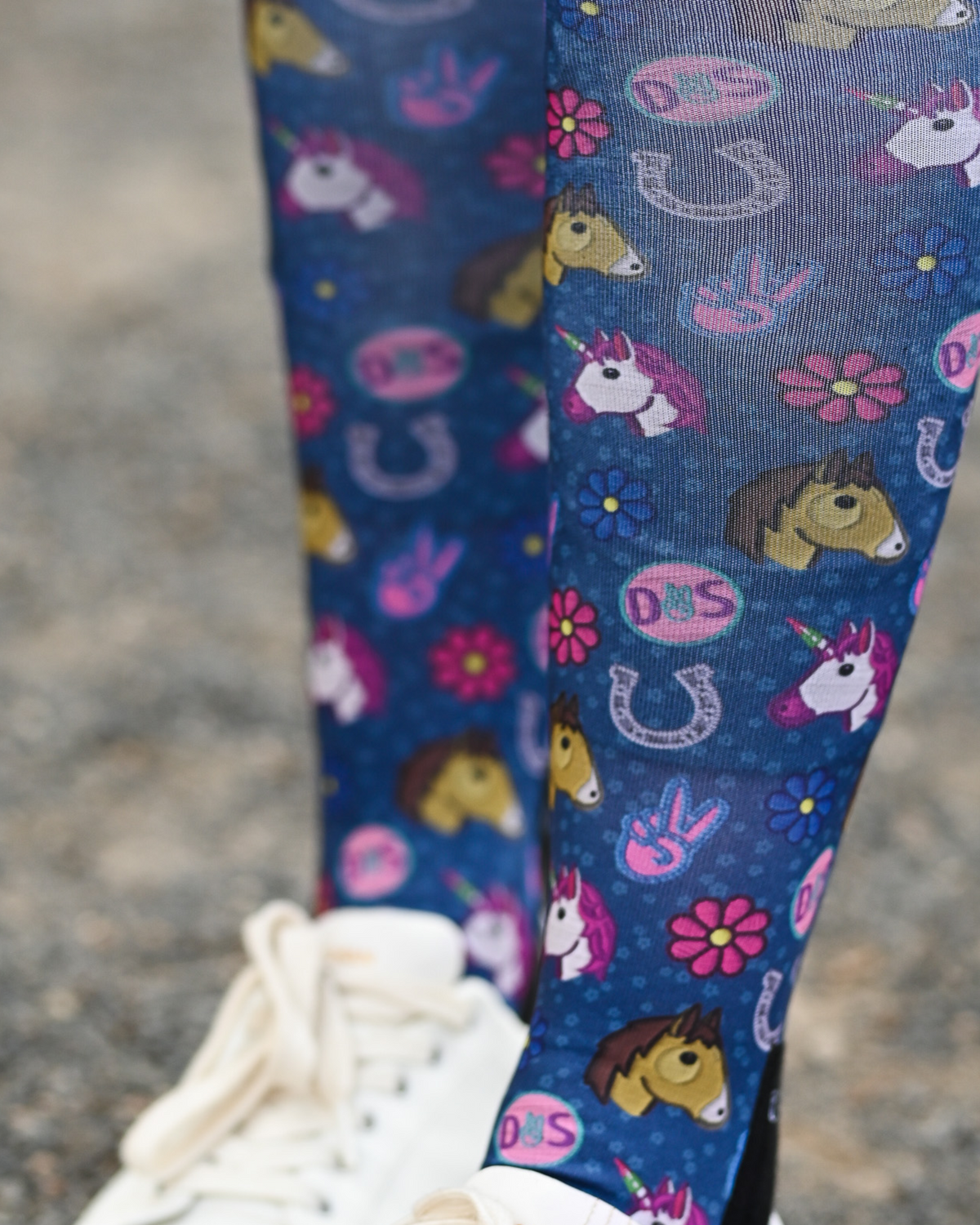 Close crop of the Patch Perfect boot sock print, unicorn, horseshoe and daisy patch badges on navy