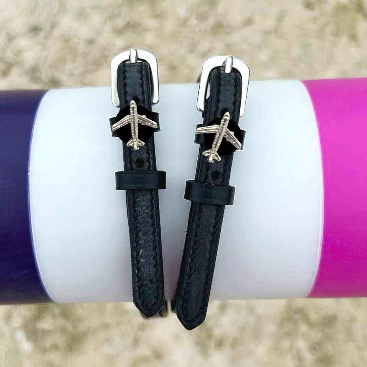 Plane Spur Straps ManeJane black leather spur straps with non-stretch interior and stainless steel buckle for English ridin.