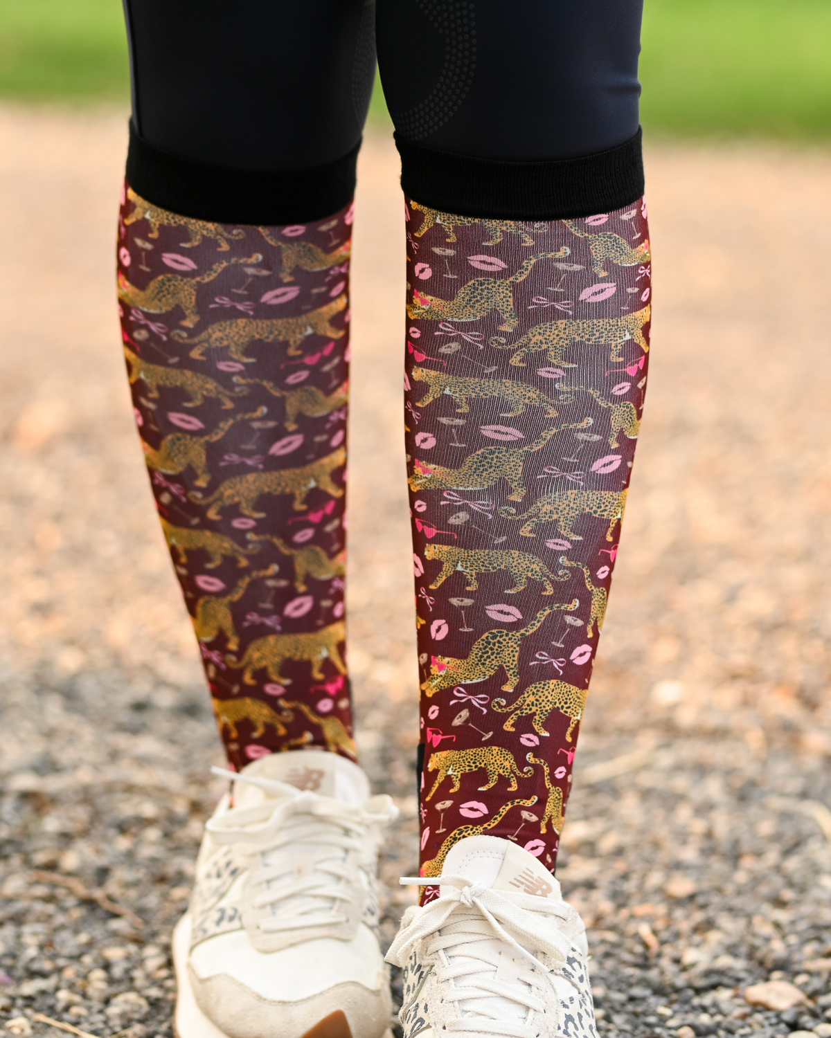 Ready to Play Pair & a Spare boot socks worn on the calf, burgundy with gold leopards, pink lips and bows