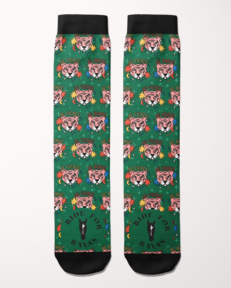 Ride for Rayas Be Brave equestrian boot socks in green with pink tiger faces, flat lay of the pair, by Dreamers & Schemers