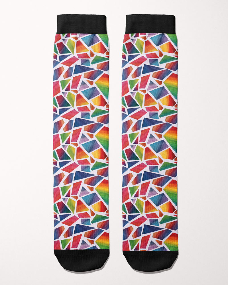 Ride for Rayas Original Art equestrian boot socks in a rainbow painted mosaic print, flat lay, by Dreamers & Schemers