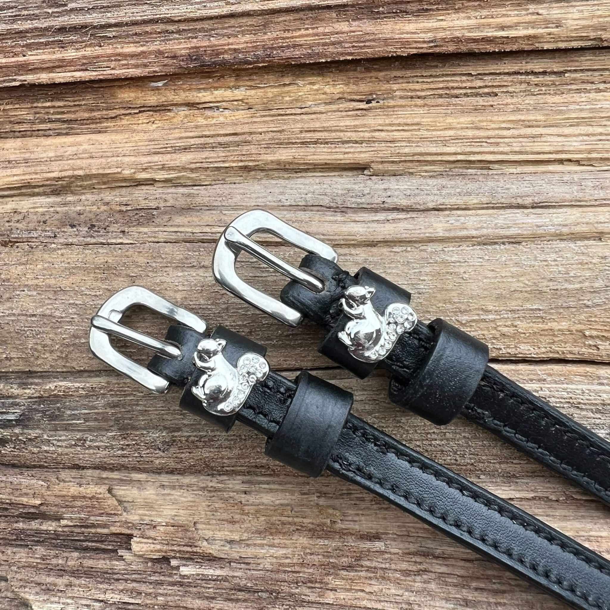 ManeJane Silver Squirrel Spur Straps Spur Straps — black leather, non-stretch, hero image for English riders.