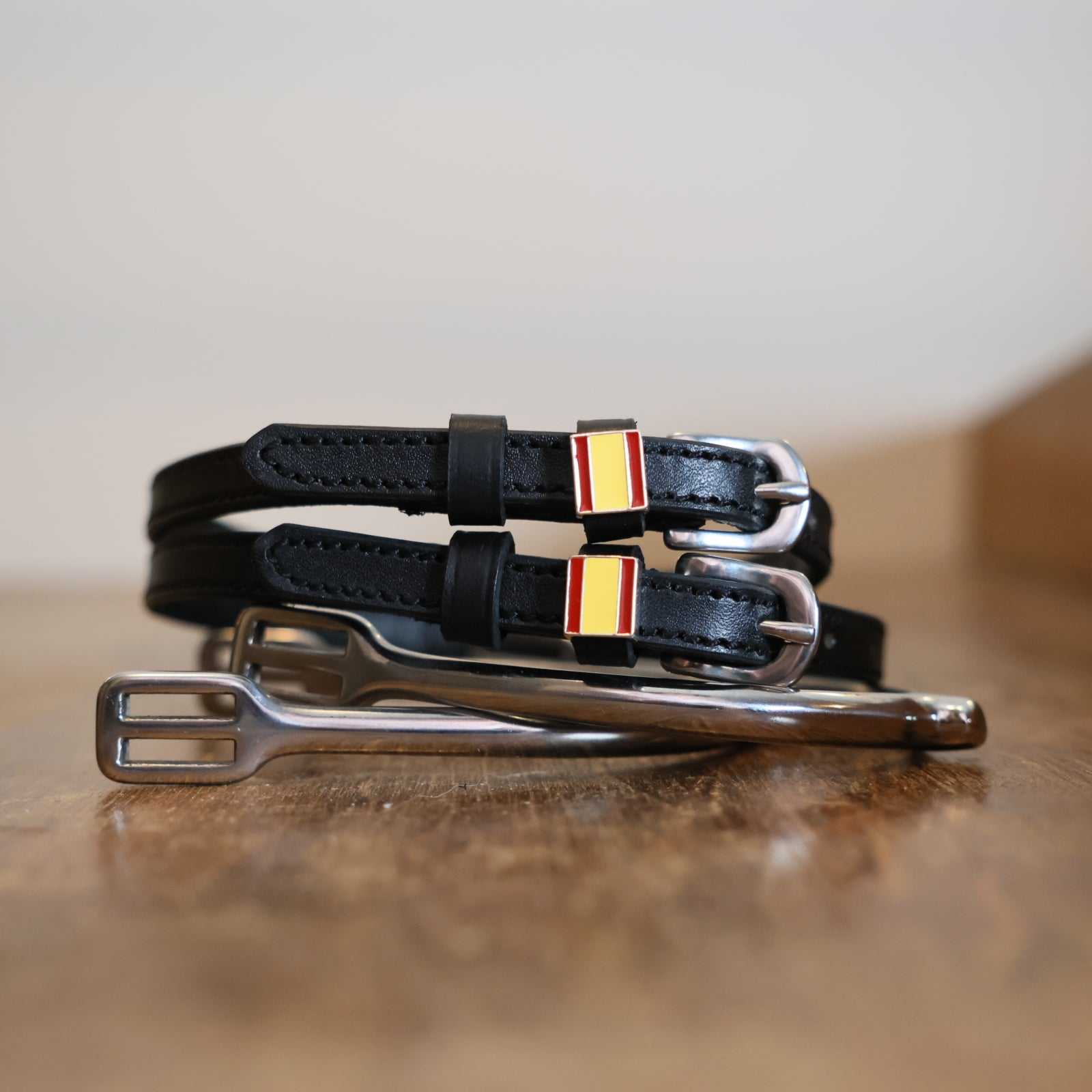 Black leather Spain Flag Spur Straps with stainless steel buckle and custom charm