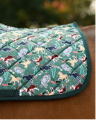 Close crop of The Naughty List print — horses in string lights with trees, presents and stars