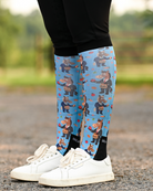 Treat Tax equestrian boot socks worn at the barn, bright blue with horses in business suits paying the treat tax
