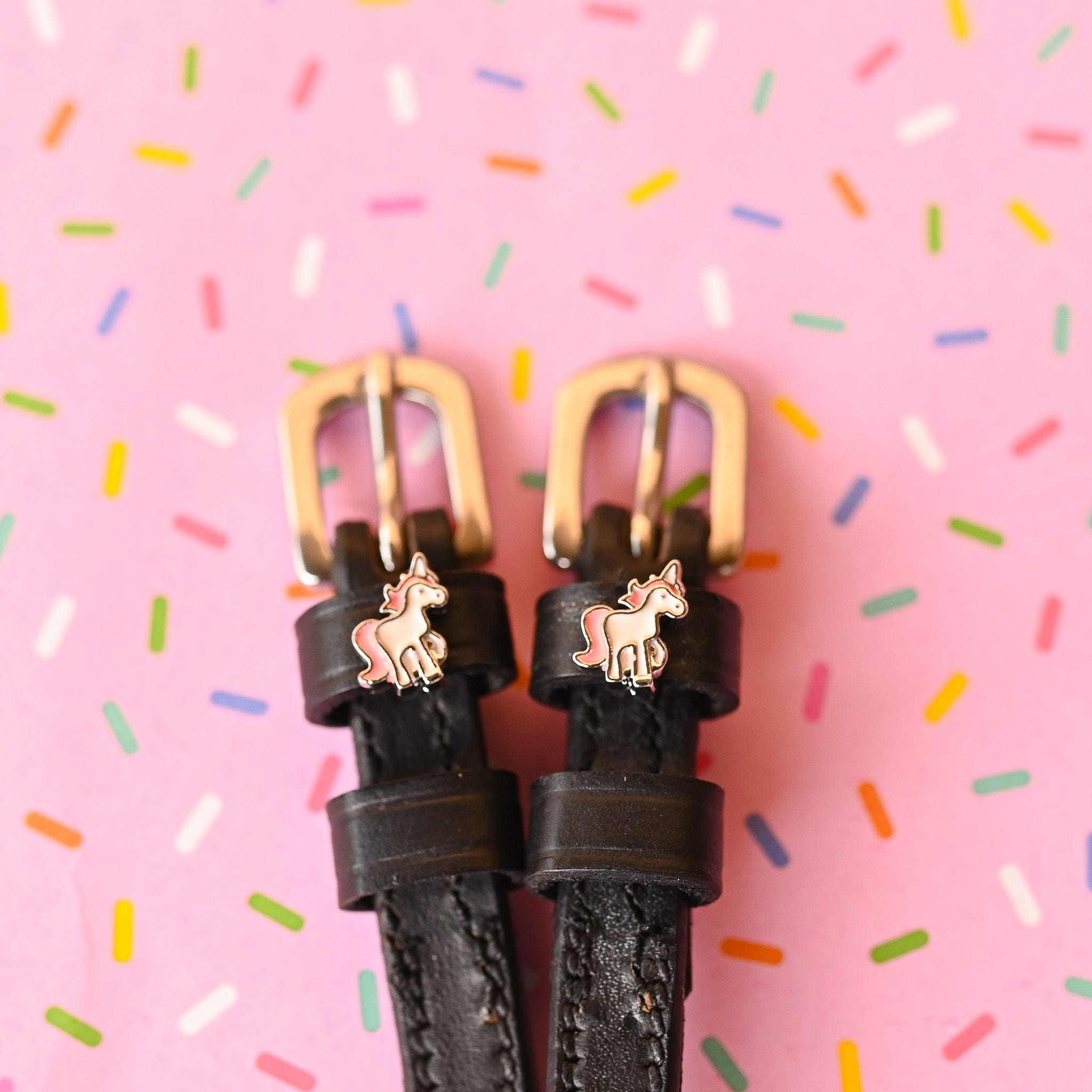 ManeJane Unicorn Prancing Spur Straps Spur Straps — black leather, non-stretch, hero image for English riders.