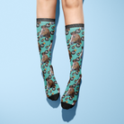 Custom Solo socks with horse photo and F Bombs pattern on teal background