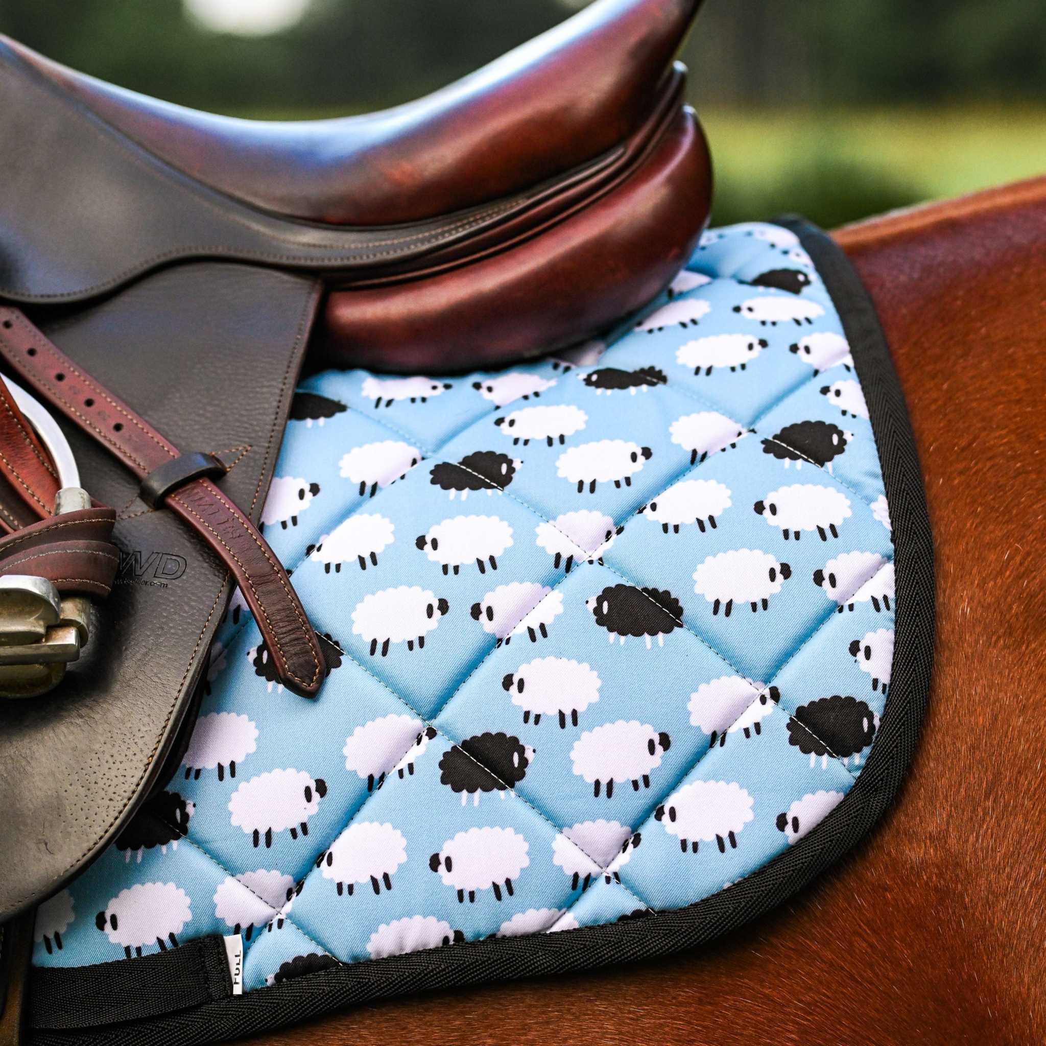 Dreamers & Schemers Who's a Black Sheep Saddle Pad – patterned saddle pad, equestrian gift, horseback riding gear from Dreamers & Schemers Saddle Pads