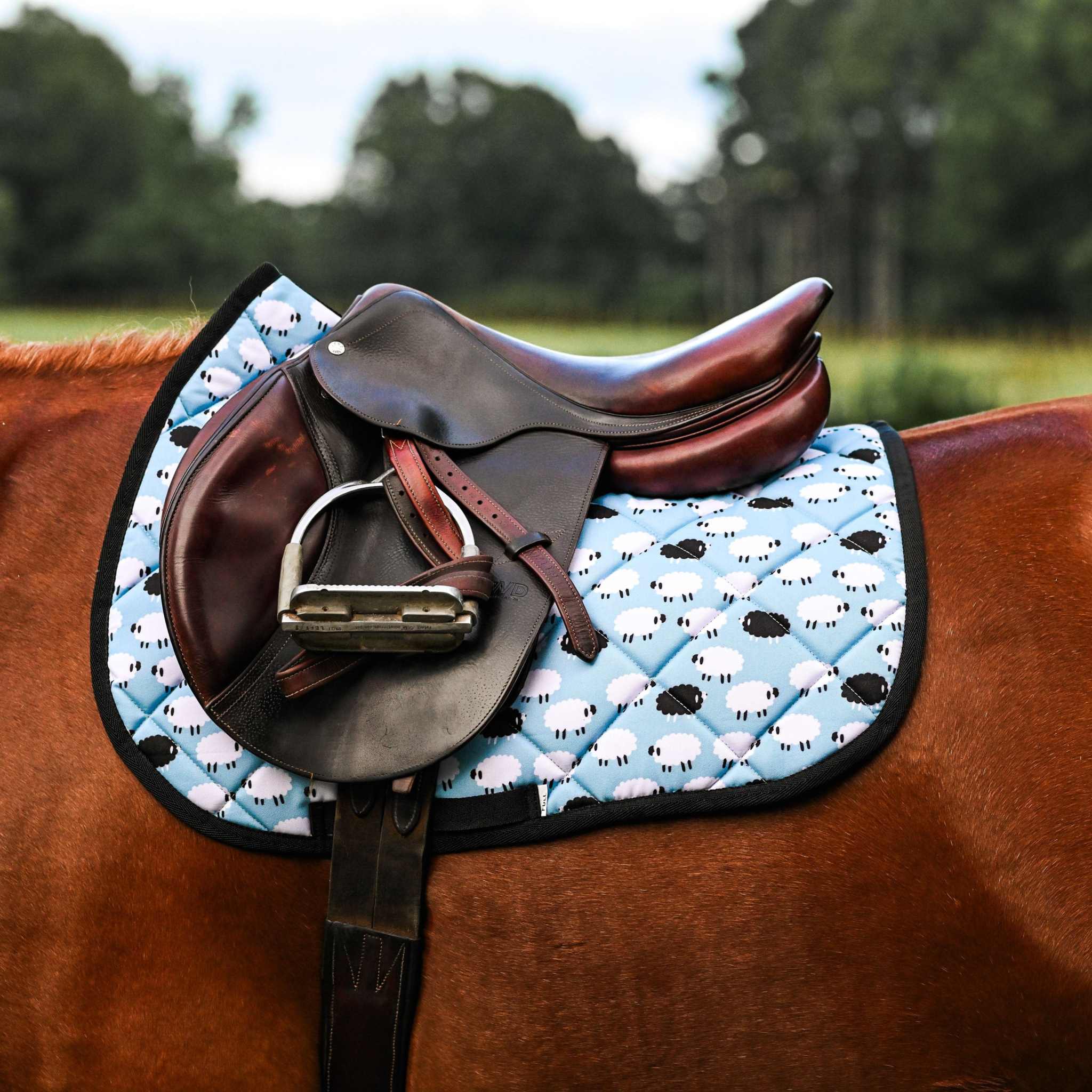 Dreamers & Schemers Who's a Black Sheep Saddle Pad – patterned saddle pad, equestrian gift, horseback riding gear from Dreamers & Schemers Saddle Pads